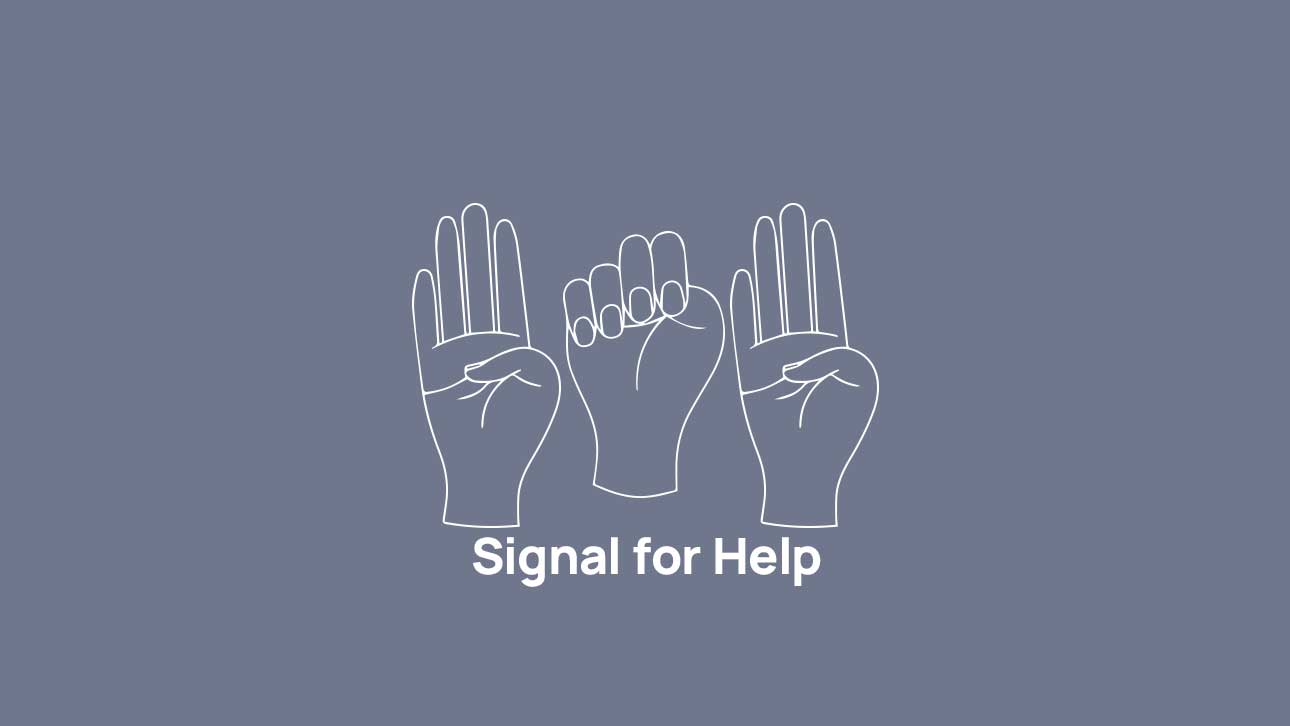 How to Ask for Help Discreetly While Traveling: The Hand Signal, Angel Shot, and Other SOS Signs